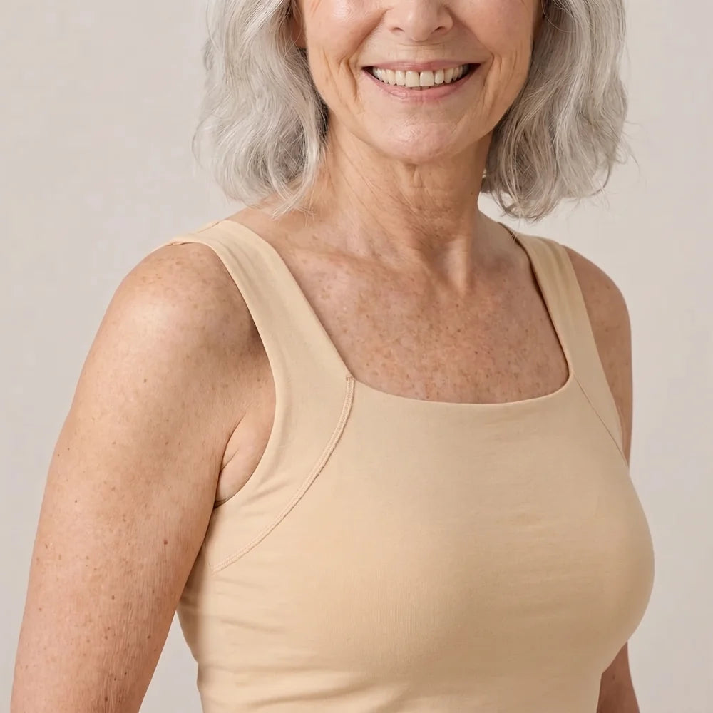 Front view of the Alma tank in Nude: wide straps, square neckline and sewn-in cups