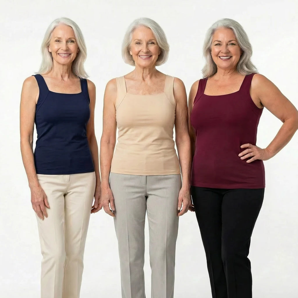Three women in their 60s wearing the tank in Navy, Nude and Burgundy